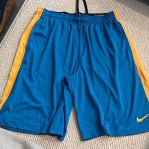 Nike basketball Blue Shorts with Orange Trim